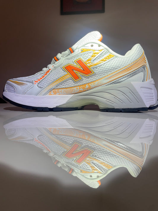 New Balance 740 🟠⚪️                            Unisexe